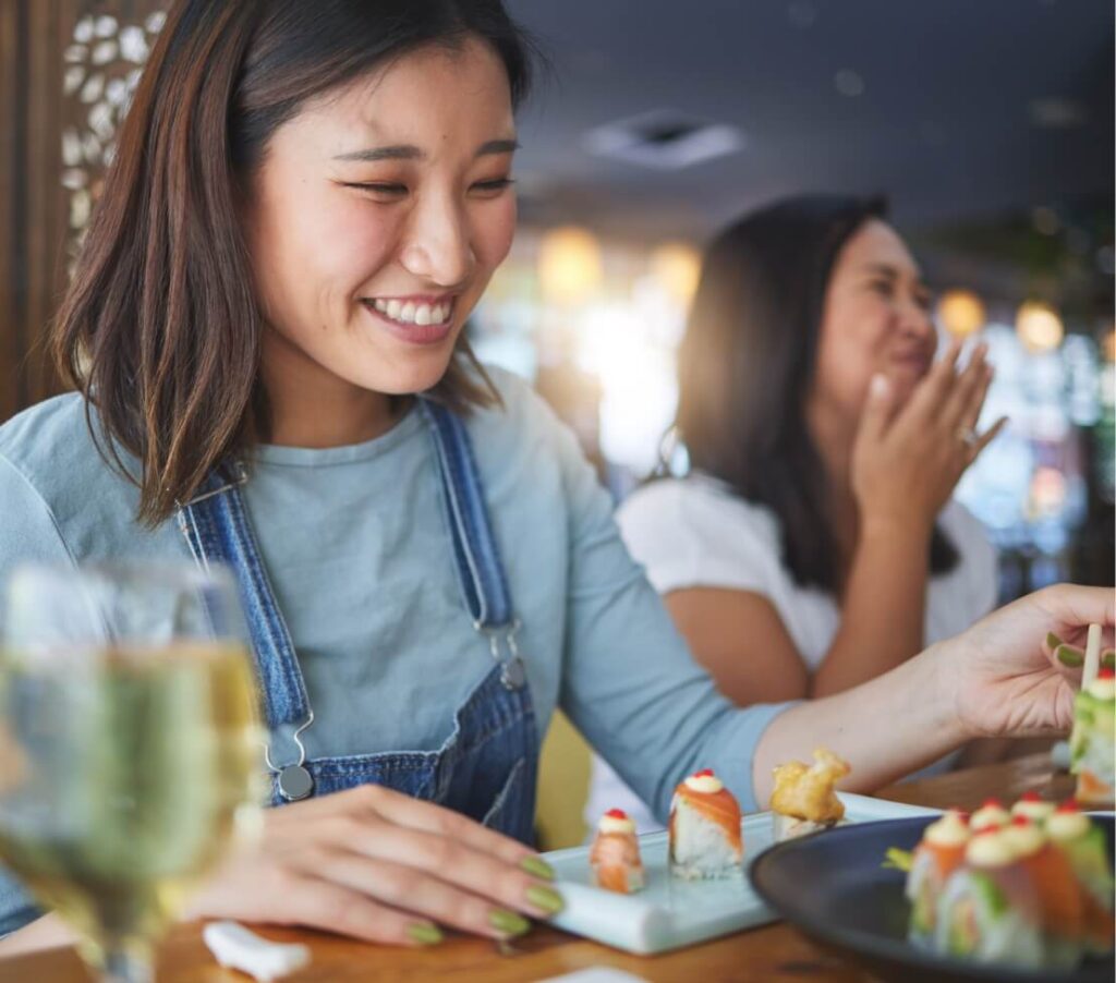 japanese-woman-restaurant-and-eating-sushi-with-s-2025-04-05-15-49-26-utc (1)