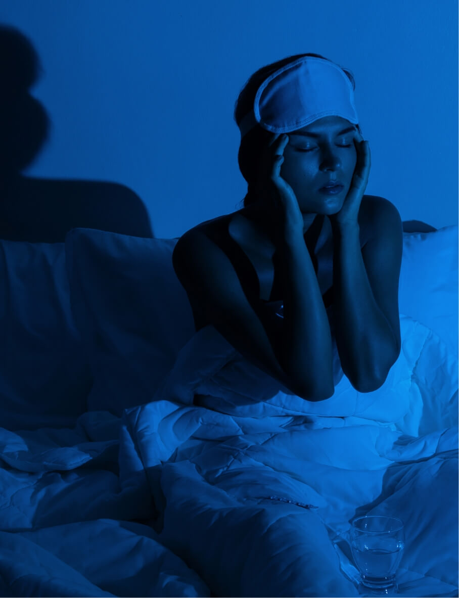woman-in-the-bedroom-with-a-glass-of-water-and-sle-2024-10-14-15-59-28-utc (1)